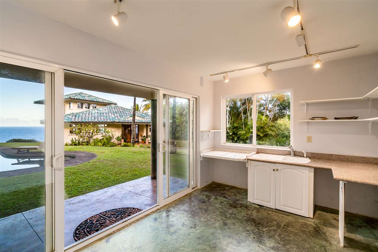 85 East Waipio Road Haiku, HI 96708 - Photo 24 of 28 a room with a large window and an open kitchen view