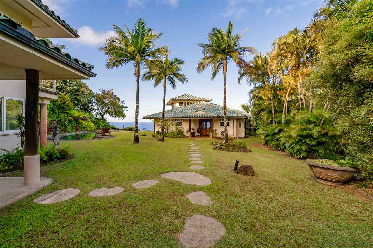 85 East Waipio Road Haiku, HI 96708 - Photo 4 of 28 a view of a swimming pool with a patio