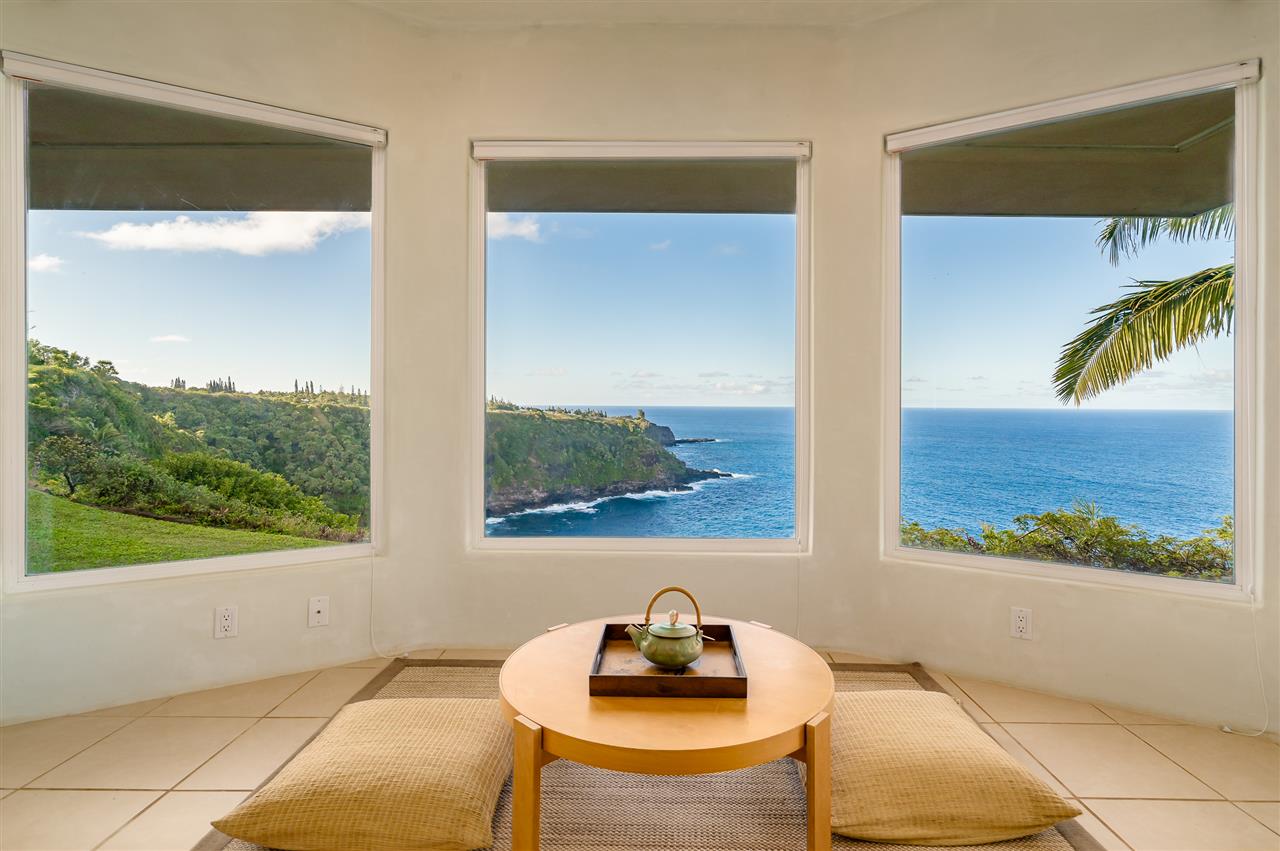 85 East Waipio Road Haiku, HI 96708 - Photo 8 of 28 a room with a window and a wooden floor