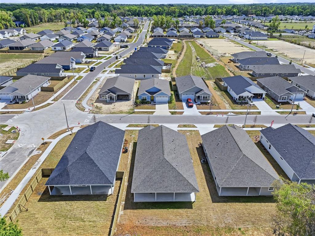 6718 Southwest 10th Lane Gainesville, FL 32607 - Photo 18 of 29 an aerial view of residential houses and outdoor space
