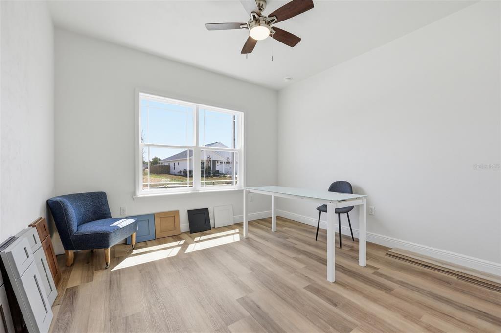 6718 Southwest 10th Lane Gainesville, FL 32607 - Photo 19 of 29 a work room with furniture and a window