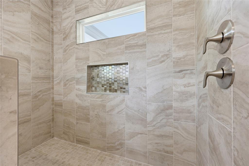 6718 Southwest 10th Lane Gainesville, FL 32607 - Photo 9 of 29 a bathroom with a shower