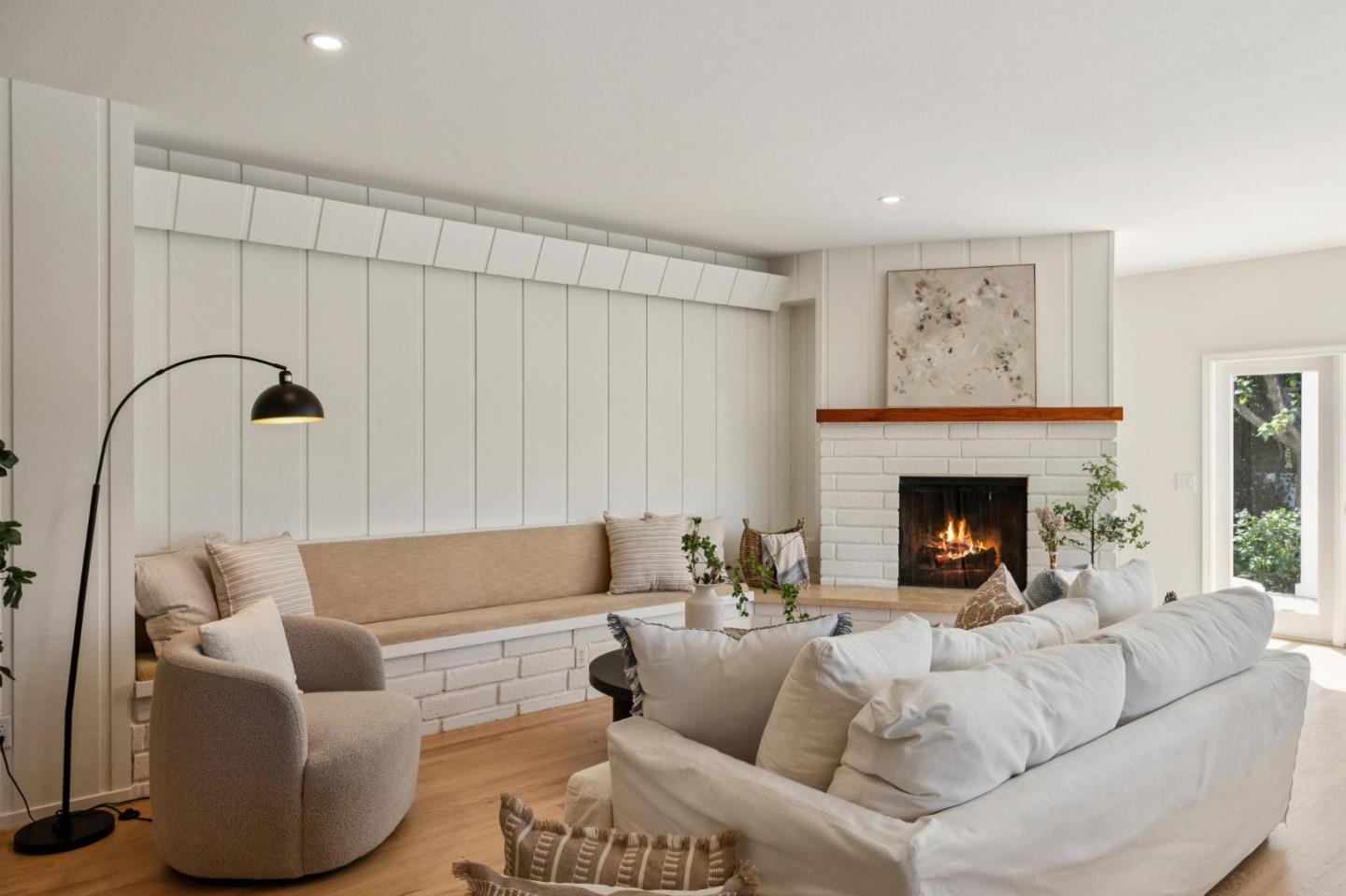 5700 Carmel Valley Road Carmel, CA 93923 - Photo 11 of 66 a living room with furniture and a fireplace