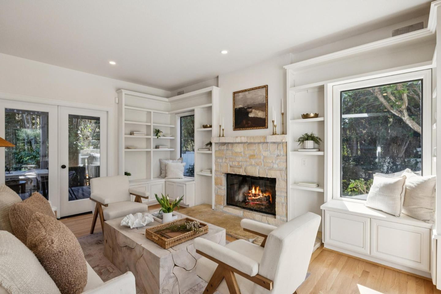 5700 Carmel Valley Road Carmel, CA 93923 - Photo 20 of 66 a living room with furniture and a fireplace