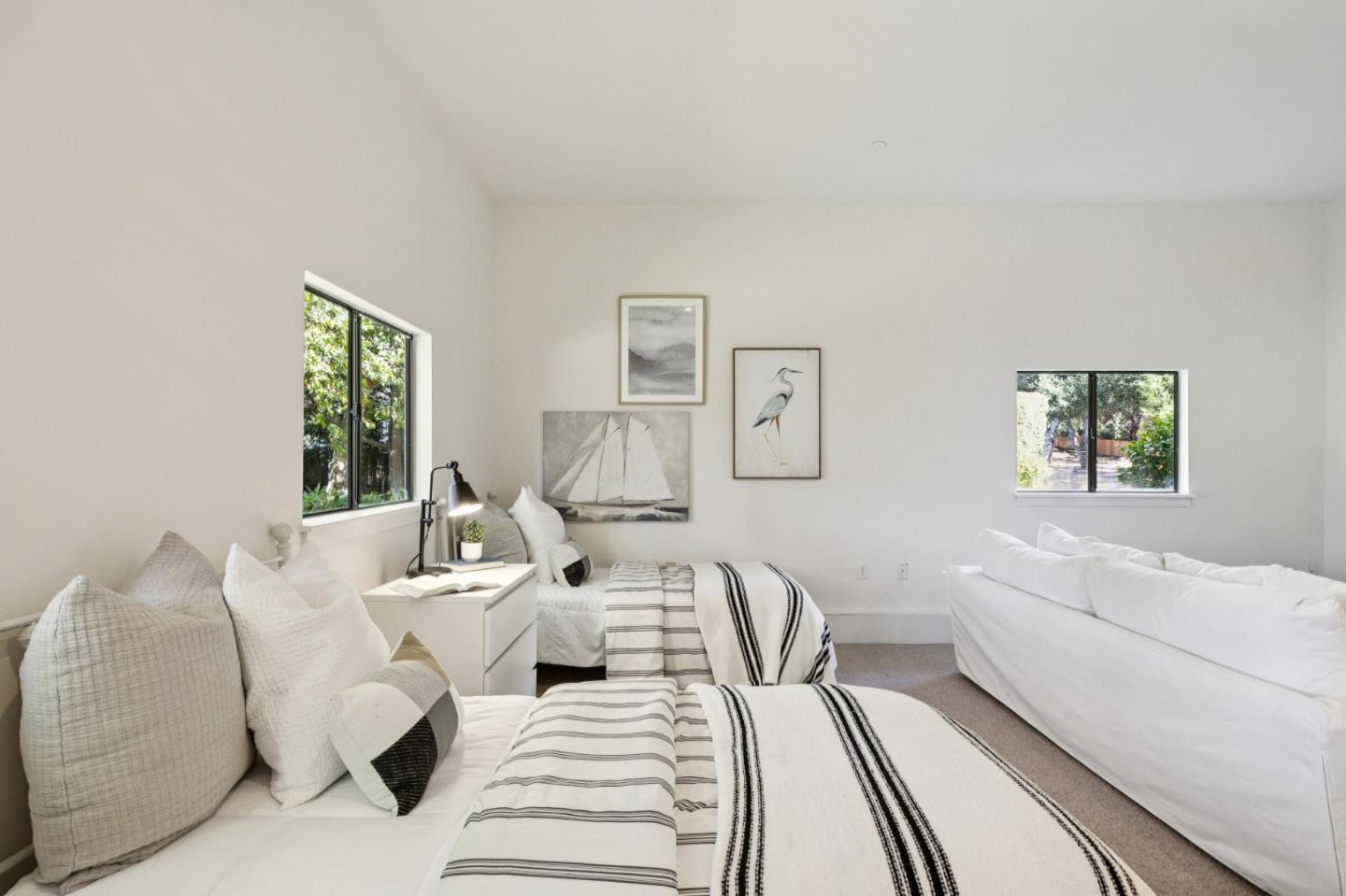 5700 Carmel Valley Road Carmel, CA 93923 - Photo 33 of 66 a living room with furniture and a large window