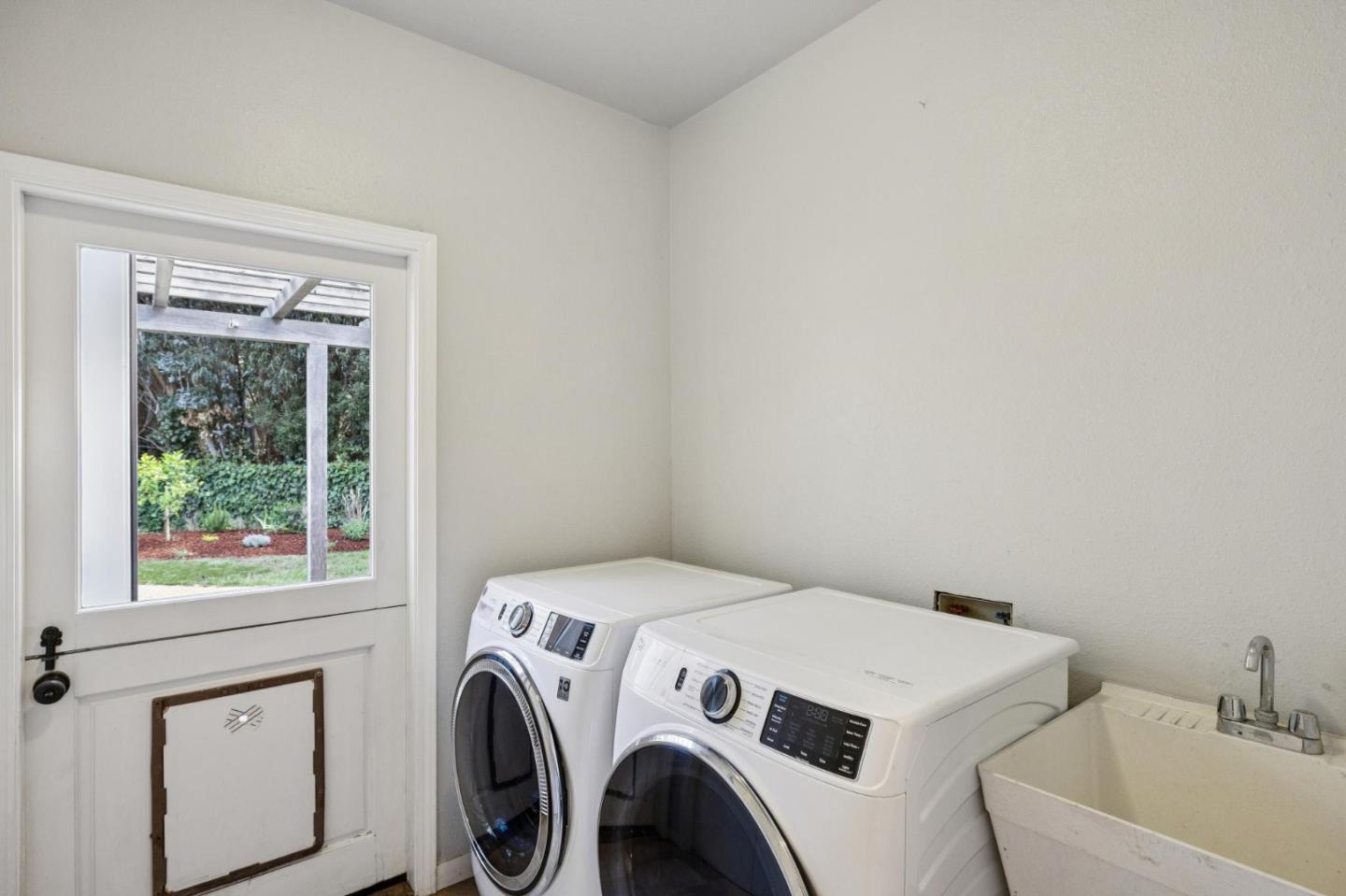 5700 Carmel Valley Road Carmel, CA 93923 - Photo 35 of 66 a utility room with dryer and washer