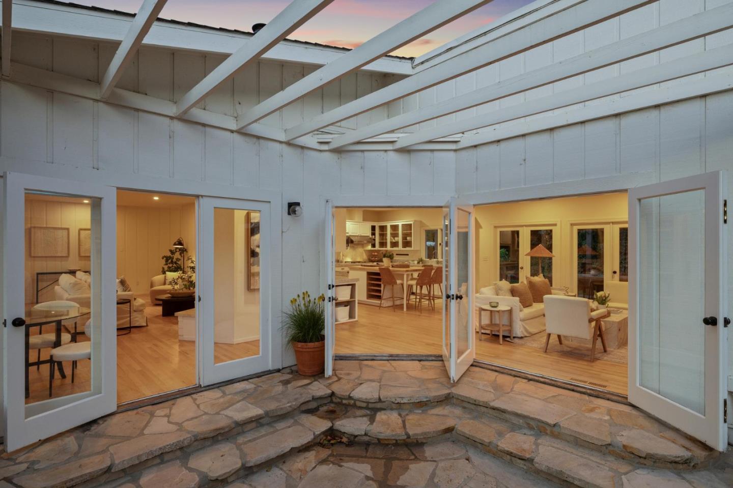 5700 Carmel Valley Road Carmel, CA 93923 - Photo 55 of 66 a view of a hallway with wooden floor and furniture
