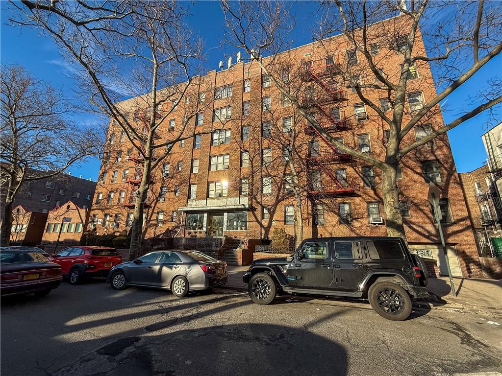 359 Ovington Avenue, Unit D2 Brooklyn, NY 11209 - Photo 25 of 25 a car parked in front of a house