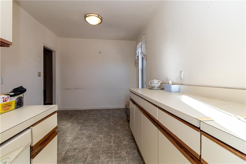 359 Ovington Avenue, Unit D2 Brooklyn, NY 11209 - Photo 10 of 25 a bathroom with a sink and a mirror