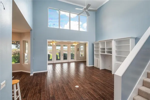 a view of kitchen and dining room with wooden floor