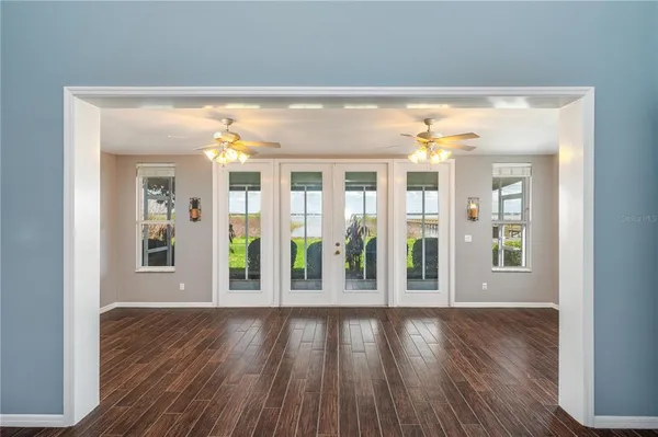 a kitchen with stainless steel appliances a refrigerator and a stove top oven