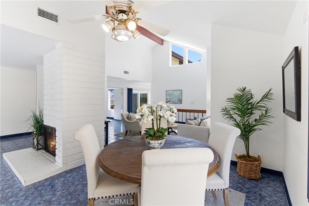 233 Brookshire Place Brea, CA 92821 - Photo 13 of 46 a living room with furniture potted plant and a mirror