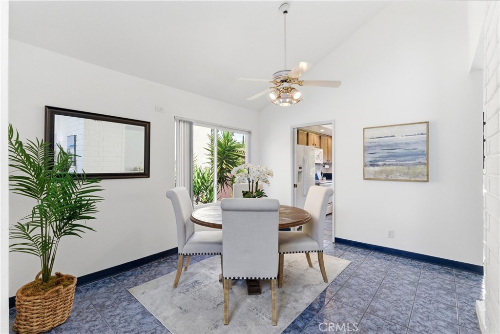 233 Brookshire Place Brea, CA 92821 - Photo 14 of 46 a view of a dining room with furniture and a potted plant