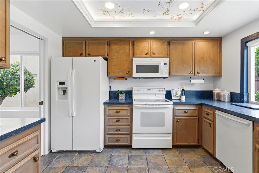 233 Brookshire Place Brea, CA 92821 - Photo 16 of 46 a kitchen with cabinets stainless steel appliances and a counter space