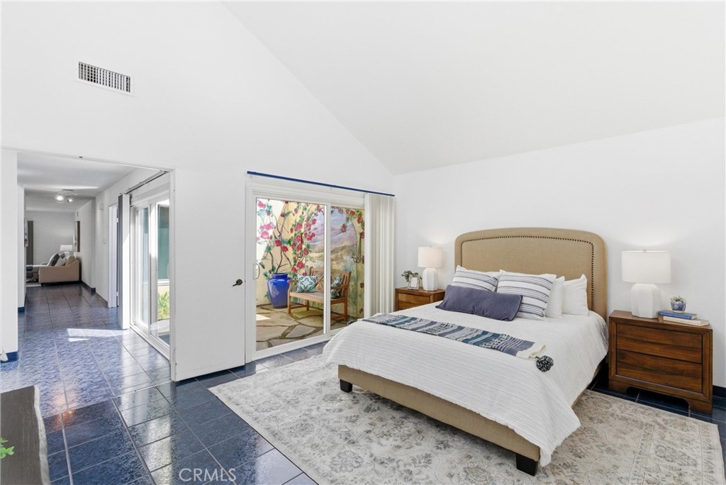 233 Brookshire Place Brea, CA 92821 - Photo 24 of 46 a bedroom with a bed and wooden floor