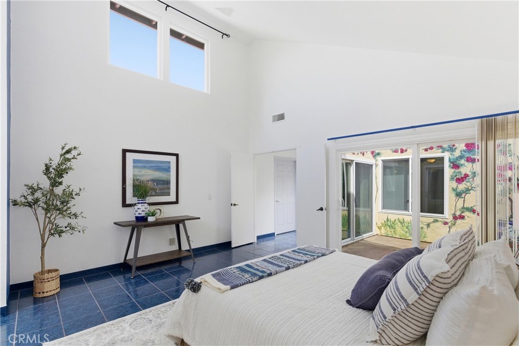 233 Brookshire Place Brea, CA 92821 - Photo 25 of 46 a bedroom with a bed and a potted plant