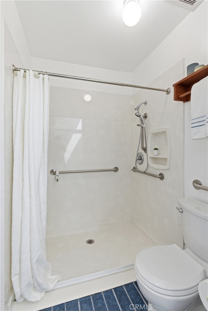 233 Brookshire Place Brea, CA 92821 - Photo 27 of 46 a bathroom with a shower and a toilet