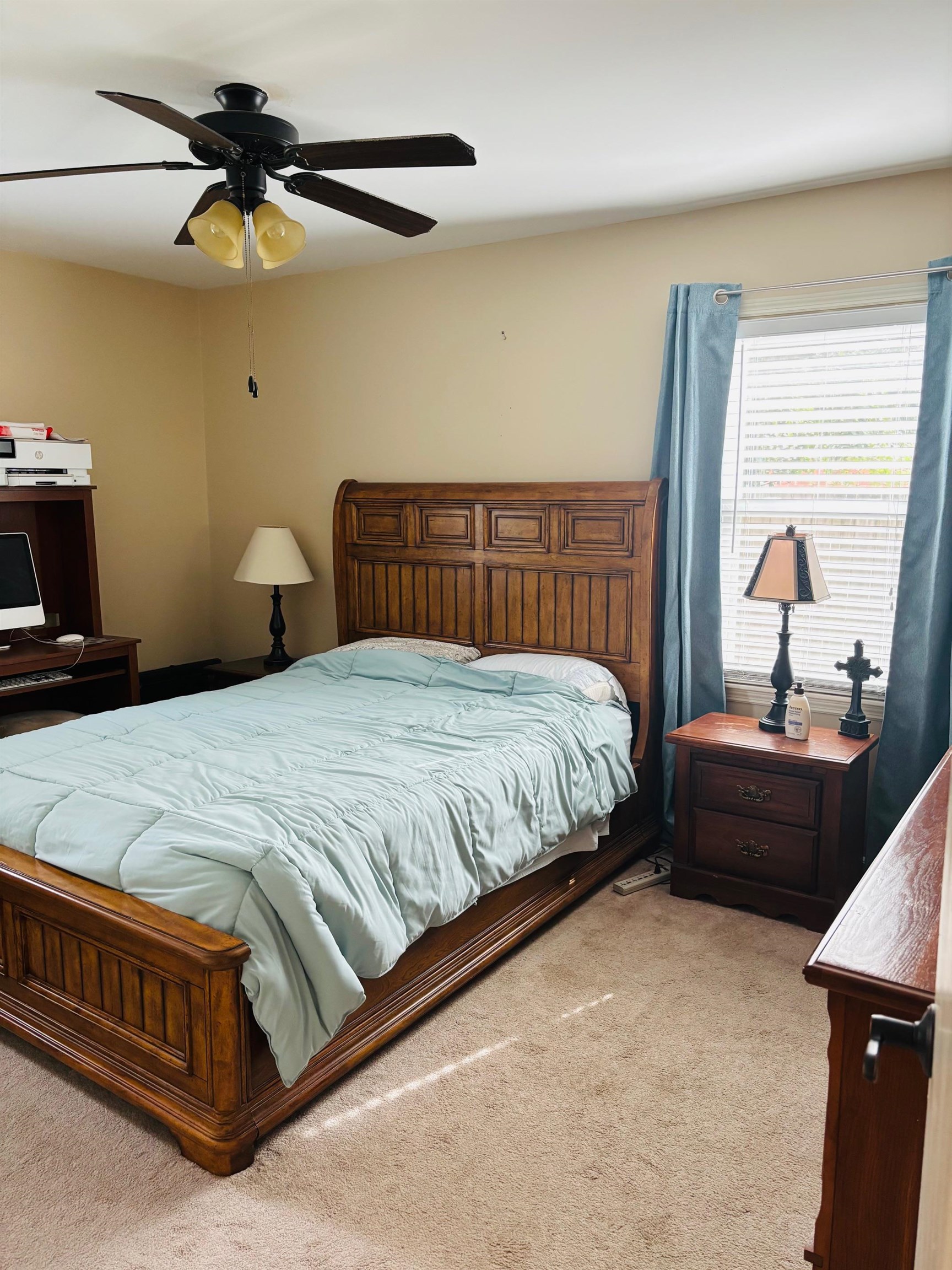 2076 Riverdale Road Germantown, TN 38138 - Photo 12 of 21 Bedroom with light carpet and ceiling fan