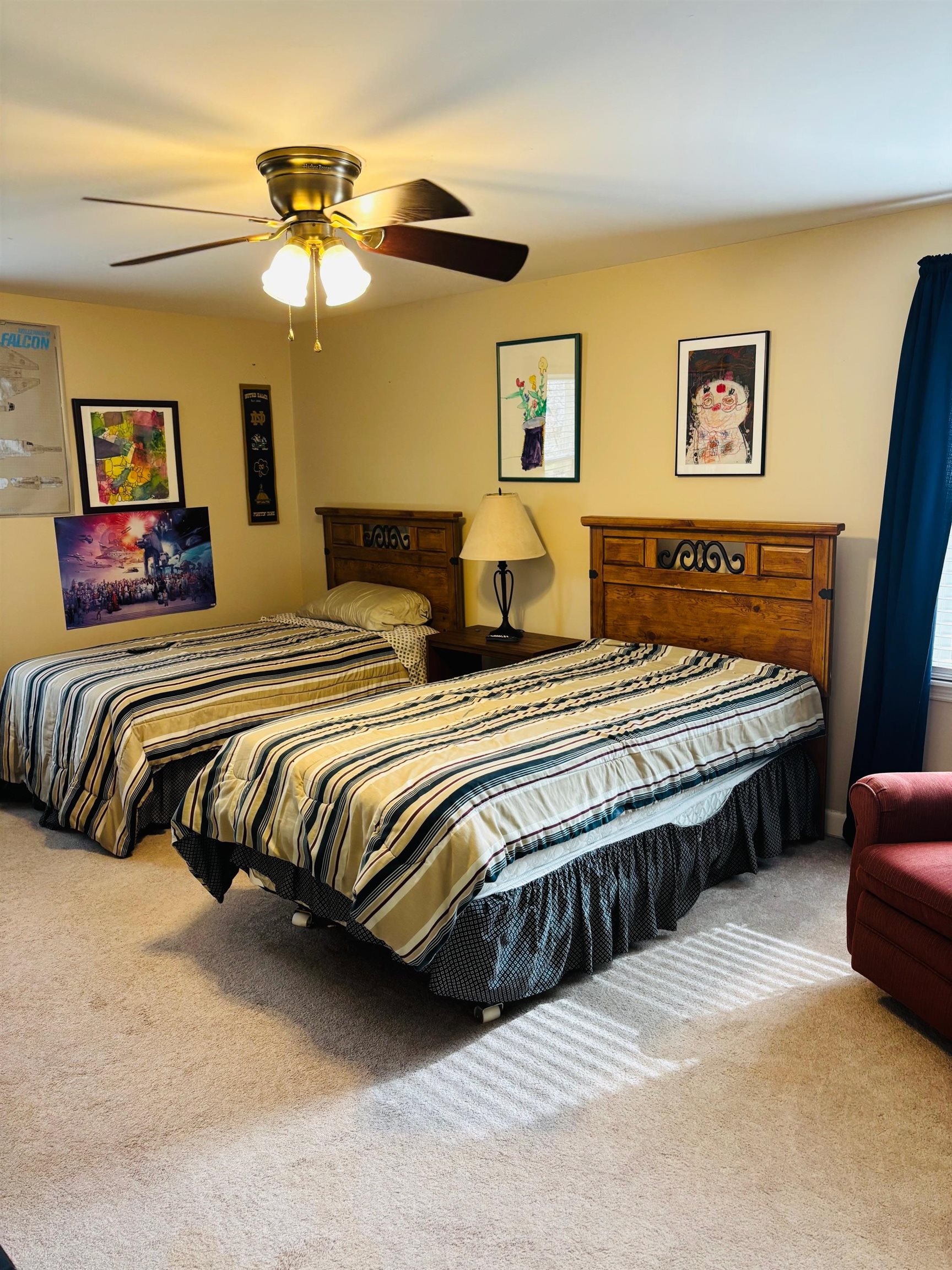 2076 Riverdale Road Germantown, TN 38138 - Photo 15 of 21 Bedroom featuring light carpet and a ceiling fan