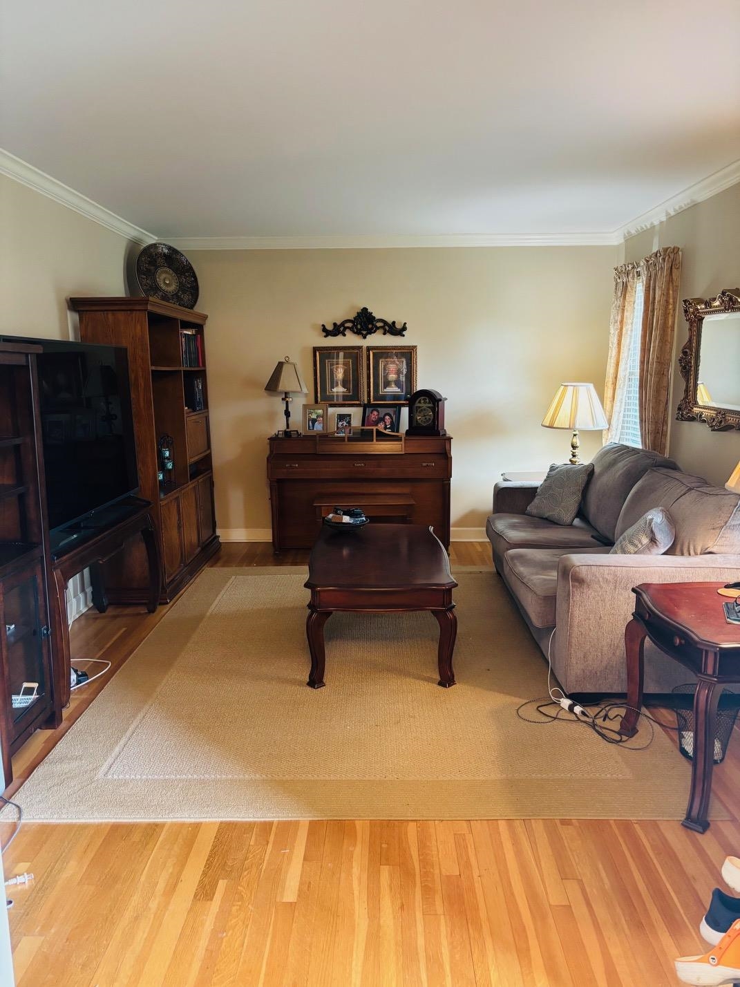 2076 Riverdale Road Germantown, TN 38138 - Photo 2 of 21 Living area featuring ornamental molding and light wood-style floors