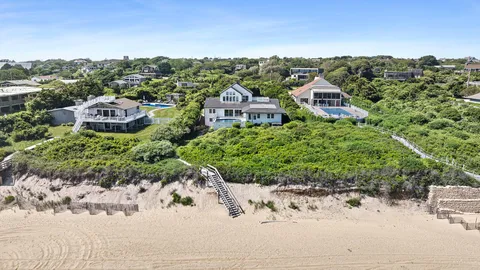 a view of a garden with a houses