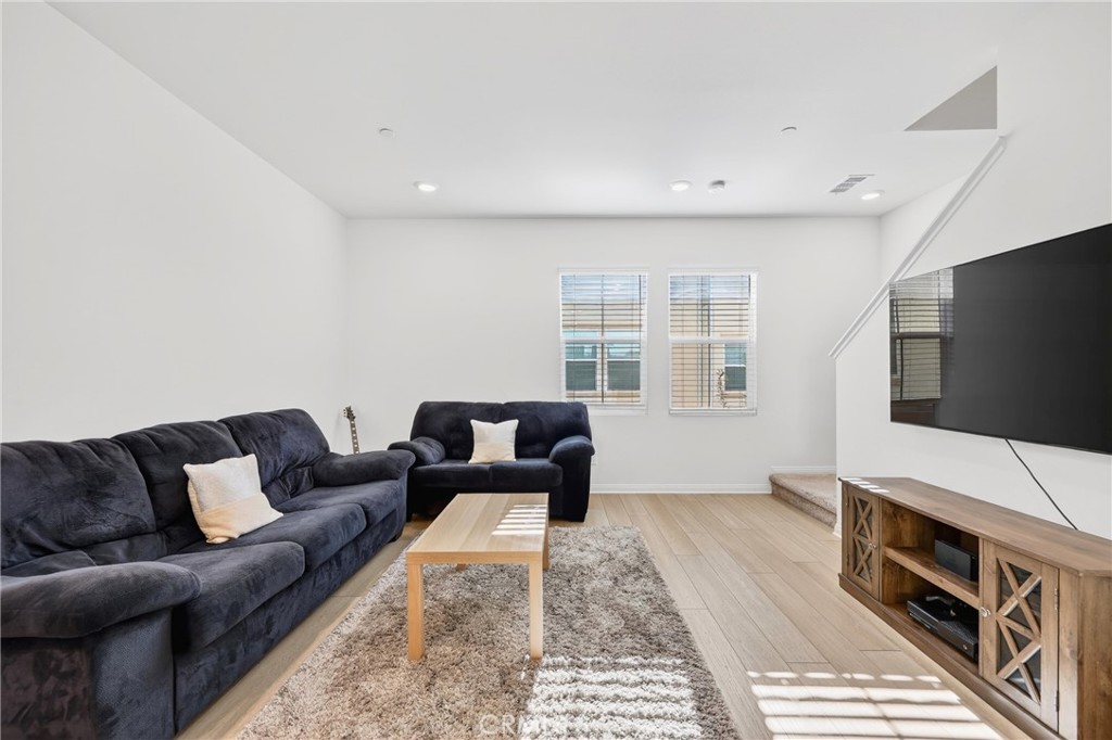 786 North Ethan Way Anaheim, CA 92805 - Photo 16 of 31 a living room with furniture and a flat screen tv