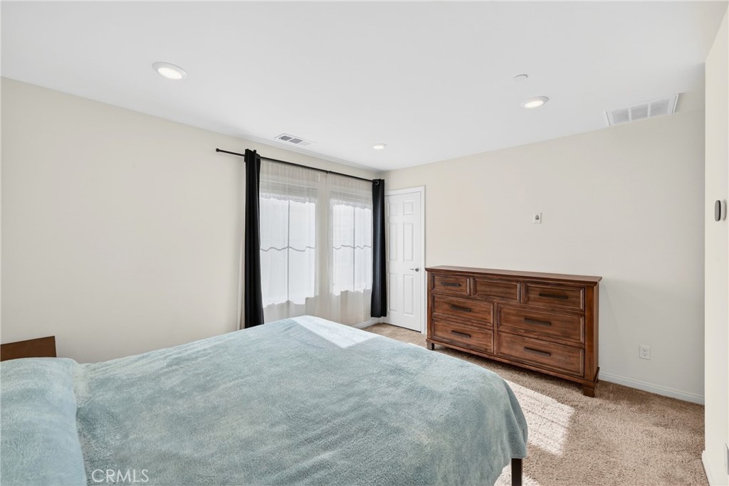 786 North Ethan Way Anaheim, CA 92805 - Photo 19 of 31 a bedroom with a bed and a dresser