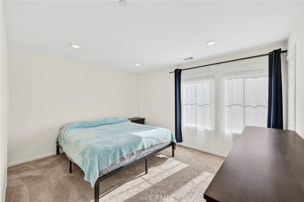 786 North Ethan Way Anaheim, CA 92805 - Photo 20 of 31 a bedroom with a bed and a window