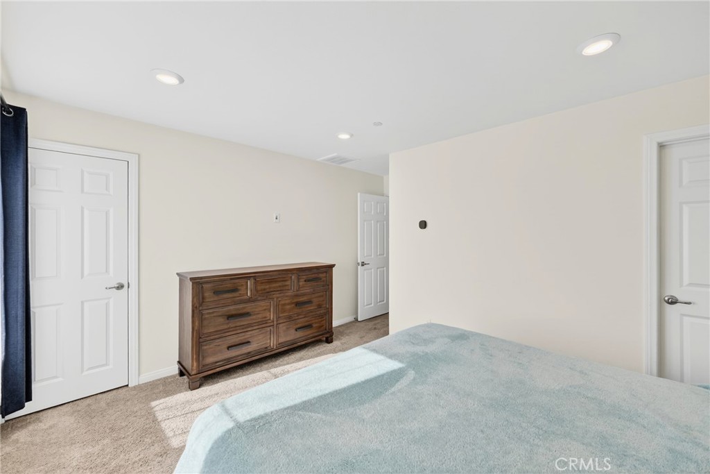 786 North Ethan Way Anaheim, CA 92805 - Photo 21 of 31 a bedroom with a bed and a dresser