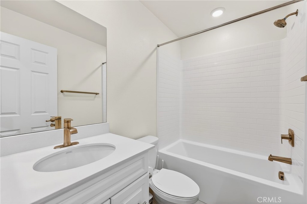 786 North Ethan Way Anaheim, CA 92805 - Photo 24 of 31 a bathroom with a granite countertop sink toilet and shower