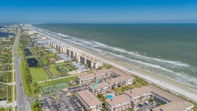a view of a balcony with an ocean view