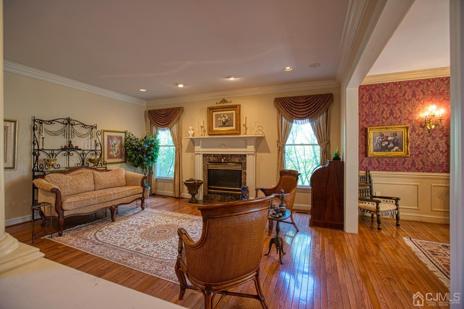 17 Grovers Mill Road Plainsboro, NJ 08536 - Photo 19 of 69 a living room with furniture and a fireplace