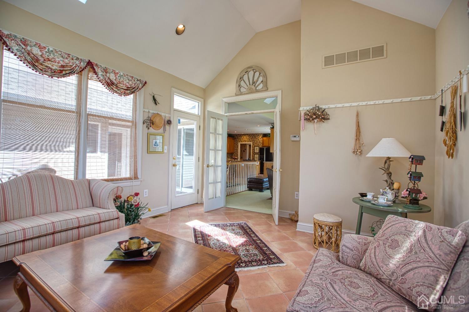 17 Grovers Mill Road Plainsboro, NJ 08536 - Photo 36 of 69 a living room with furniture and a table