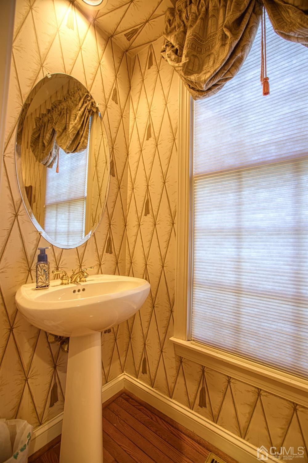 17 Grovers Mill Road Plainsboro, NJ 08536 - Photo 38 of 69 a bathroom with a sink and a mirror