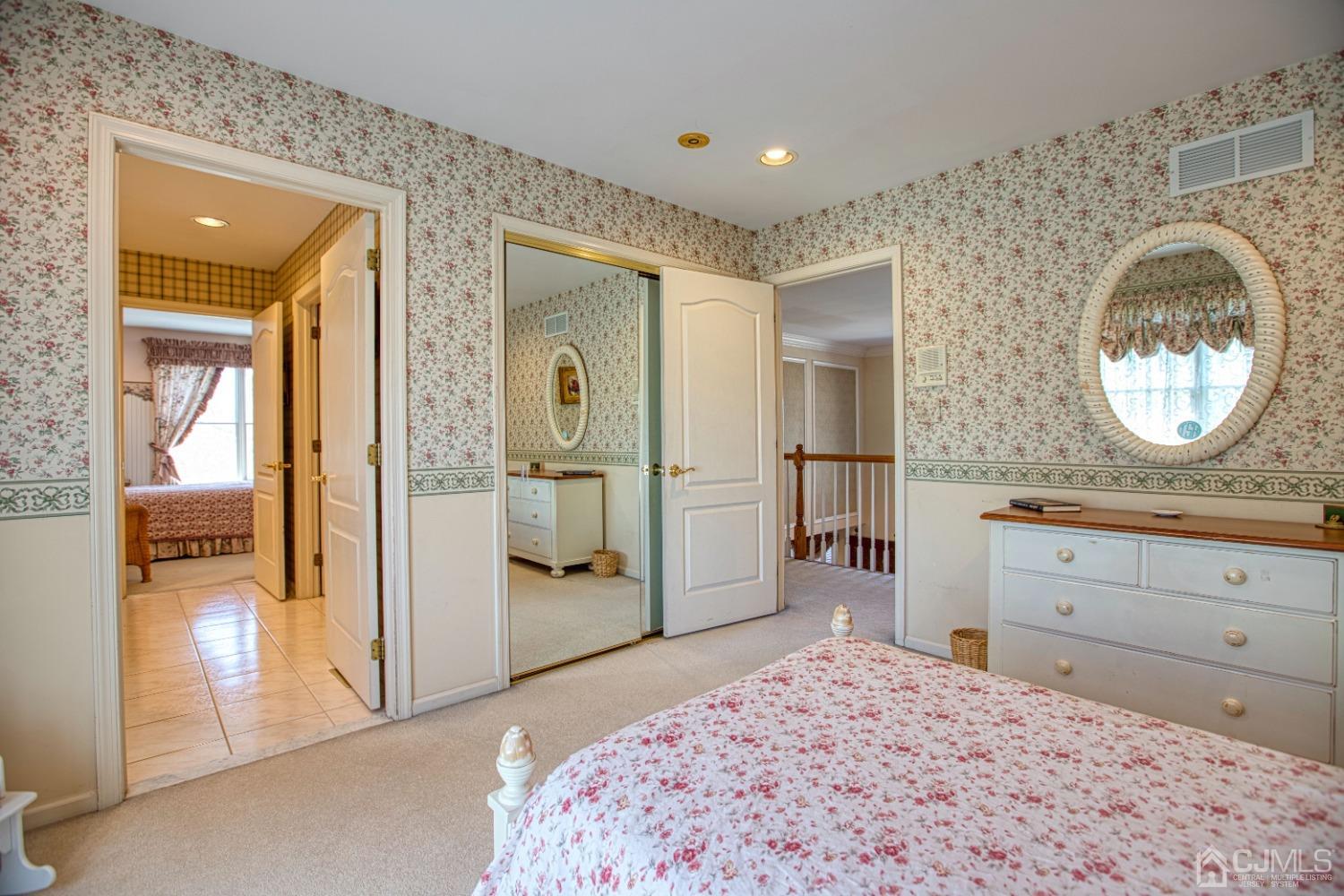 17 Grovers Mill Road Plainsboro, NJ 08536 - Photo 56 of 69 a bedroom with a bed and a dresser