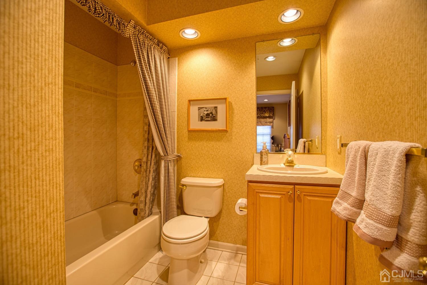 17 Grovers Mill Road Plainsboro, NJ 08536 - Photo 64 of 69 a bathroom with a granite countertop sink toilet and shower