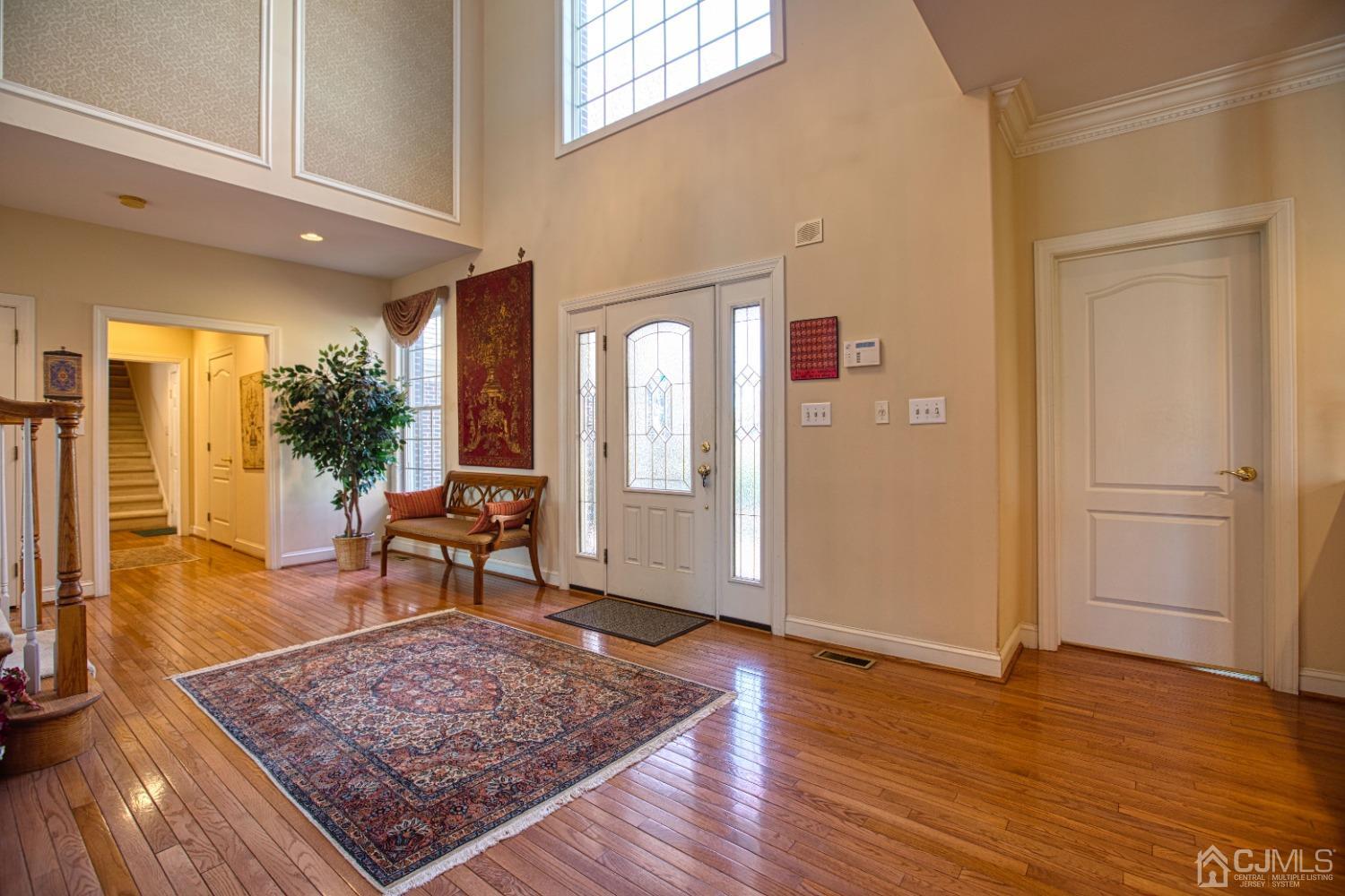 17 Grovers Mill Road Plainsboro, NJ 08536 - Photo 68 of 69 a view of a livingroom with furniture and hardwood floor