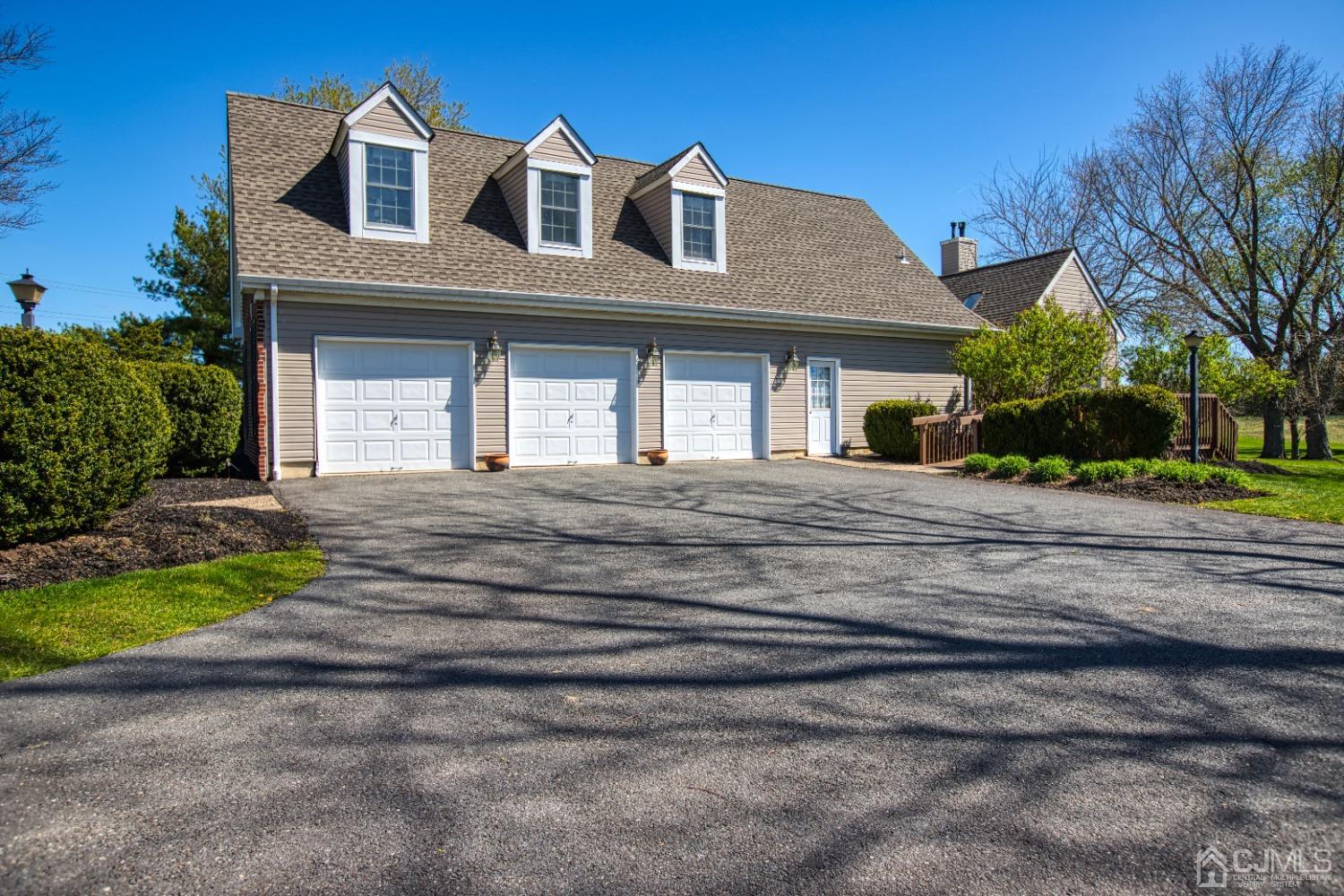 17 Grovers Mill Road Plainsboro, NJ 08536 - Photo 9 of 69 a front view of a house with a yard