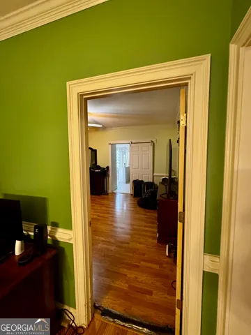 a view of a hallway with workspace