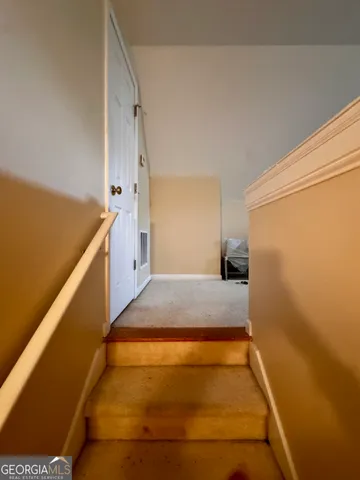 a bathroom with a tub and sink