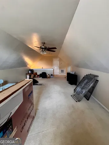 a kitchen with furniture and a stove