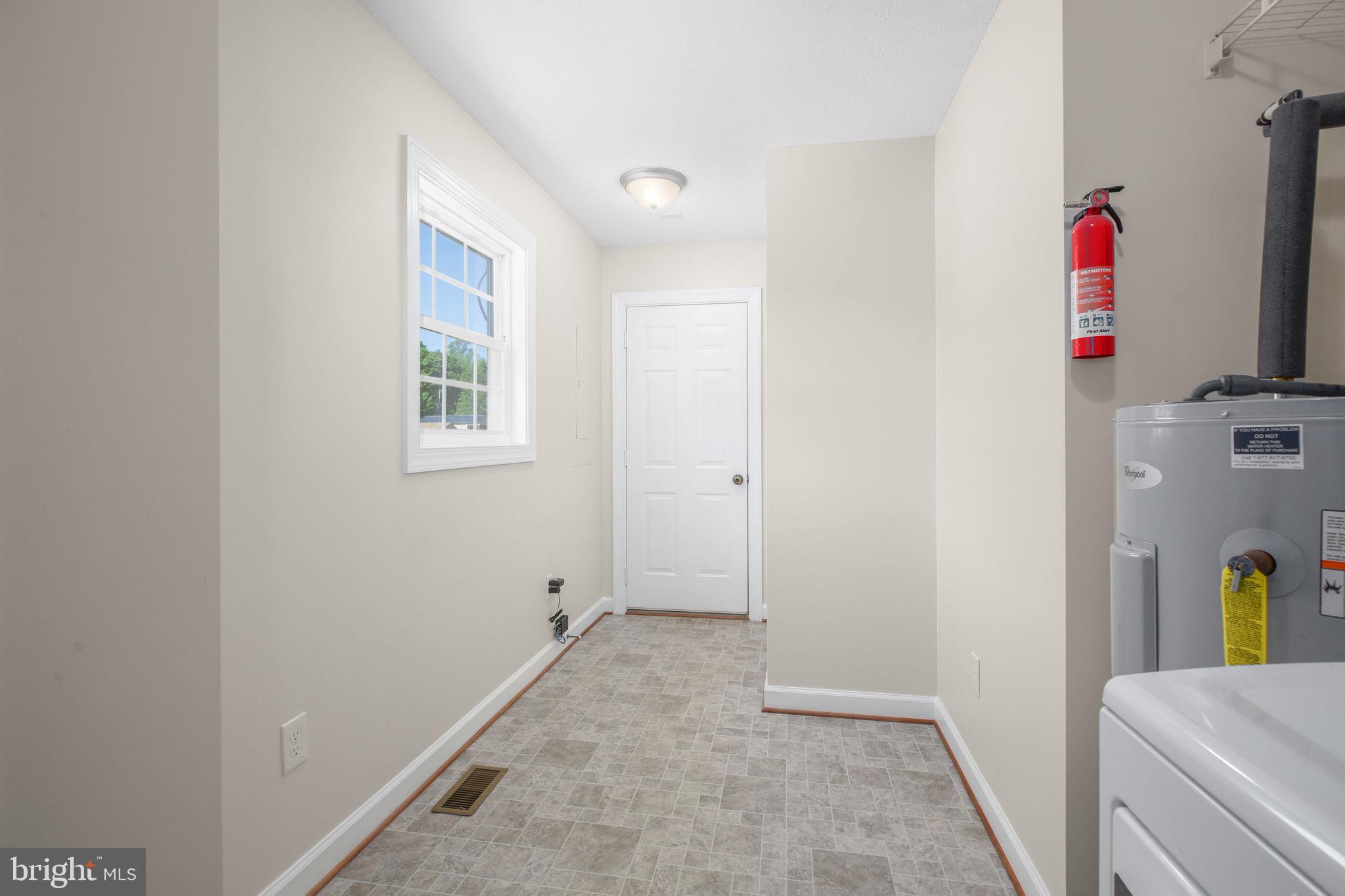 33 Austin Way Bumpass, VA 23024 - Photo 17 of 55 Laundry Room and Garage Access