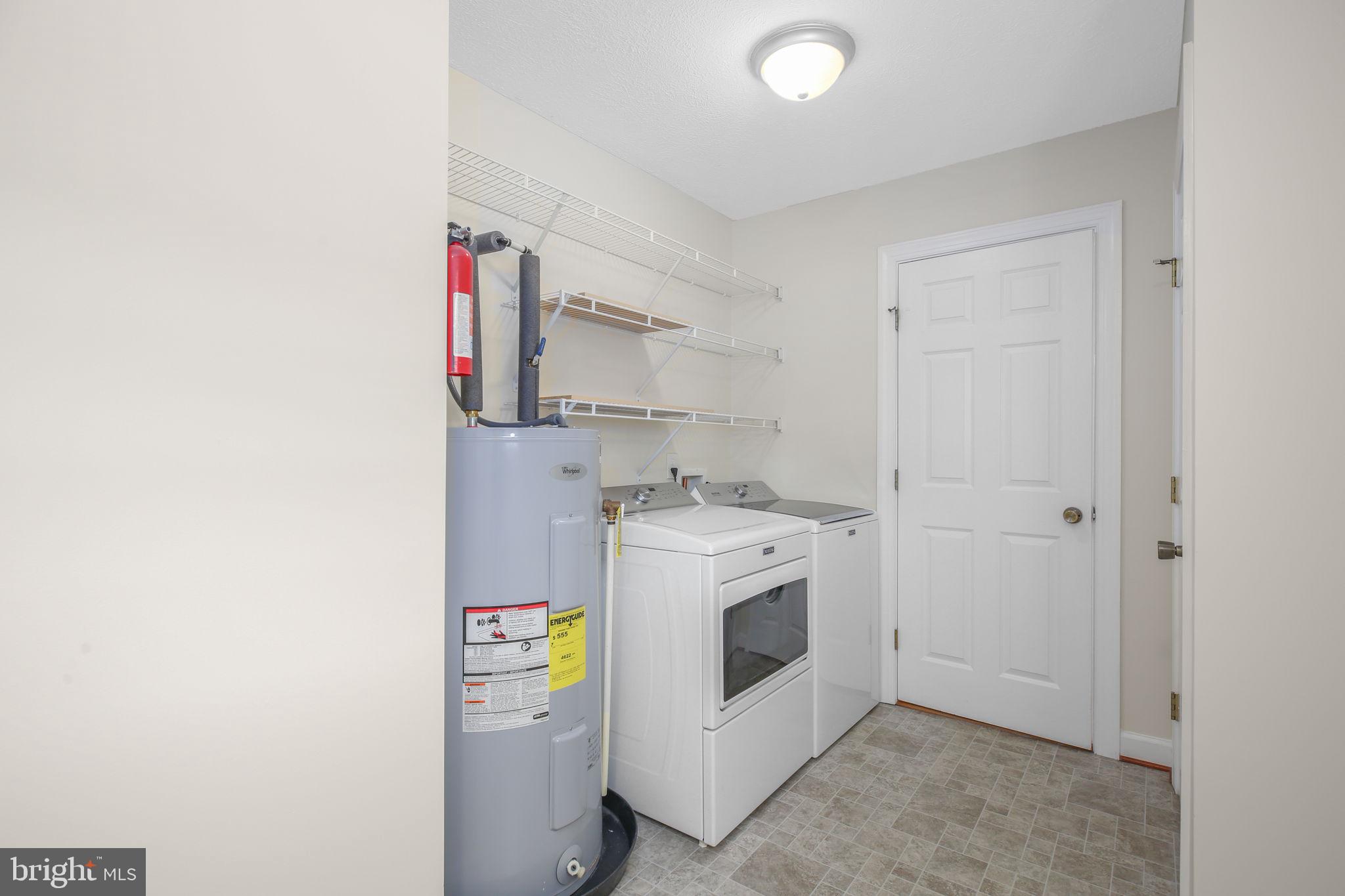 33 Austin Way Bumpass, VA 23024 - Photo 18 of 55 a utility room with dryer and washer