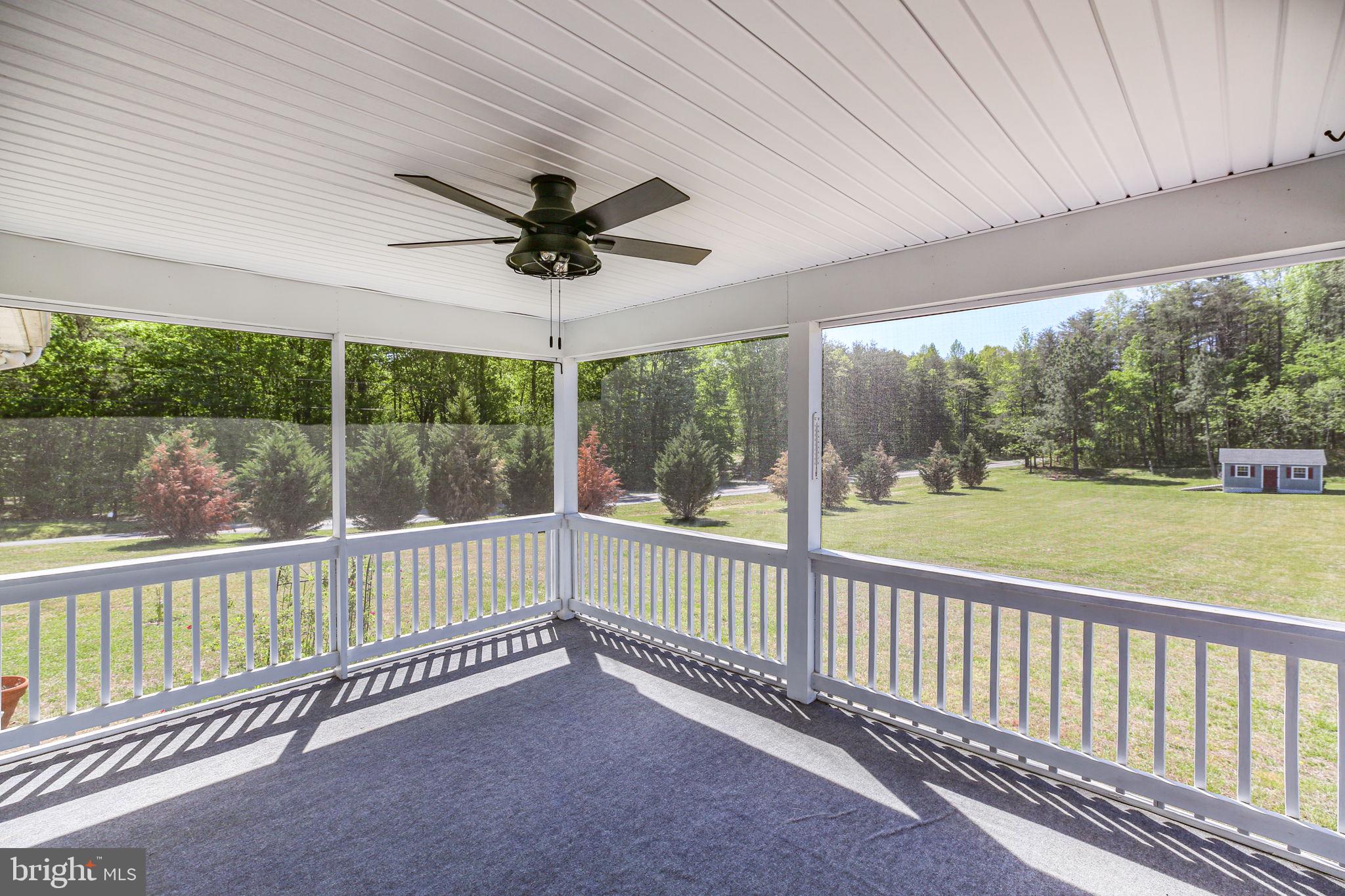 33 Austin Way Bumpass, VA 23024 - Photo 21 of 55 a view of a porch with furniture and garden