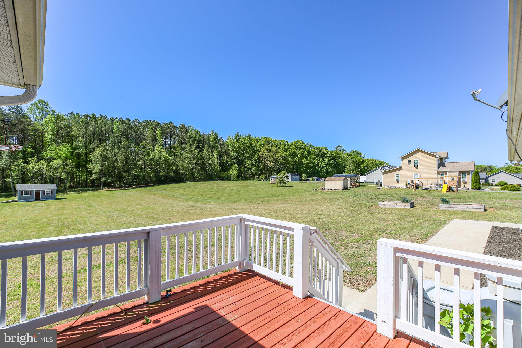 33 Austin Way Bumpass, VA 23024 - Photo 22 of 55 a view of a table and chairs on the roof deck