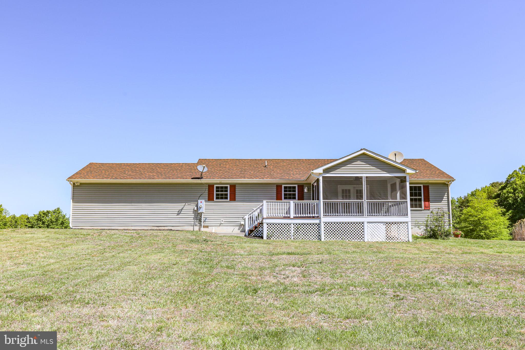 33 Austin Way Bumpass, VA 23024 - Photo 26 of 55 a front view of a house with a yard