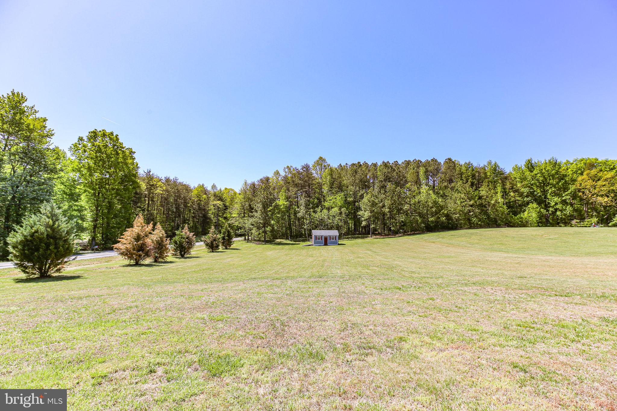 33 Austin Way Bumpass, VA 23024 - Photo 28 of 55 a view of a field with an trees