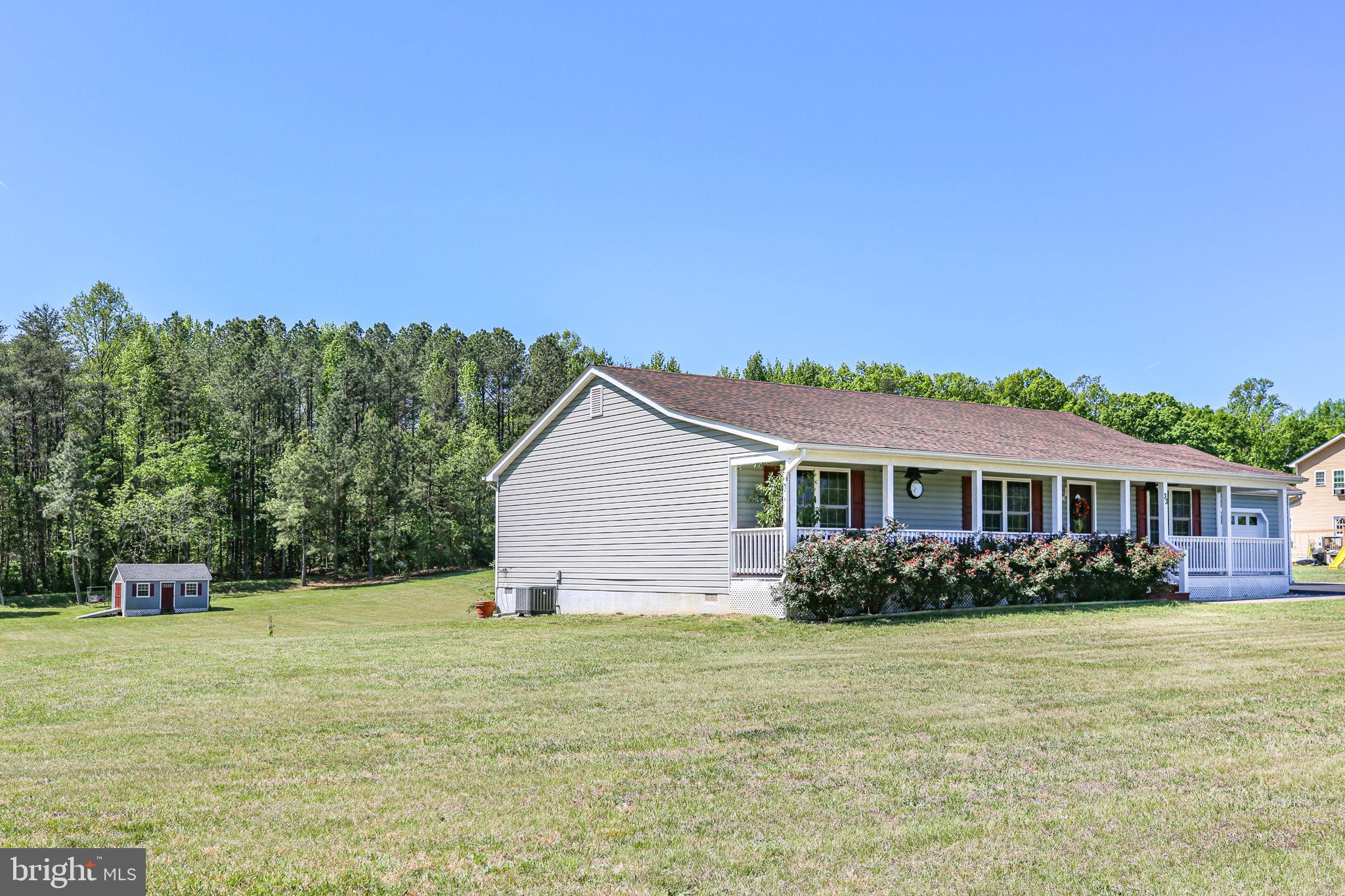 33 Austin Way Bumpass, VA 23024 - Photo 35 of 55 a view of a house with a garden