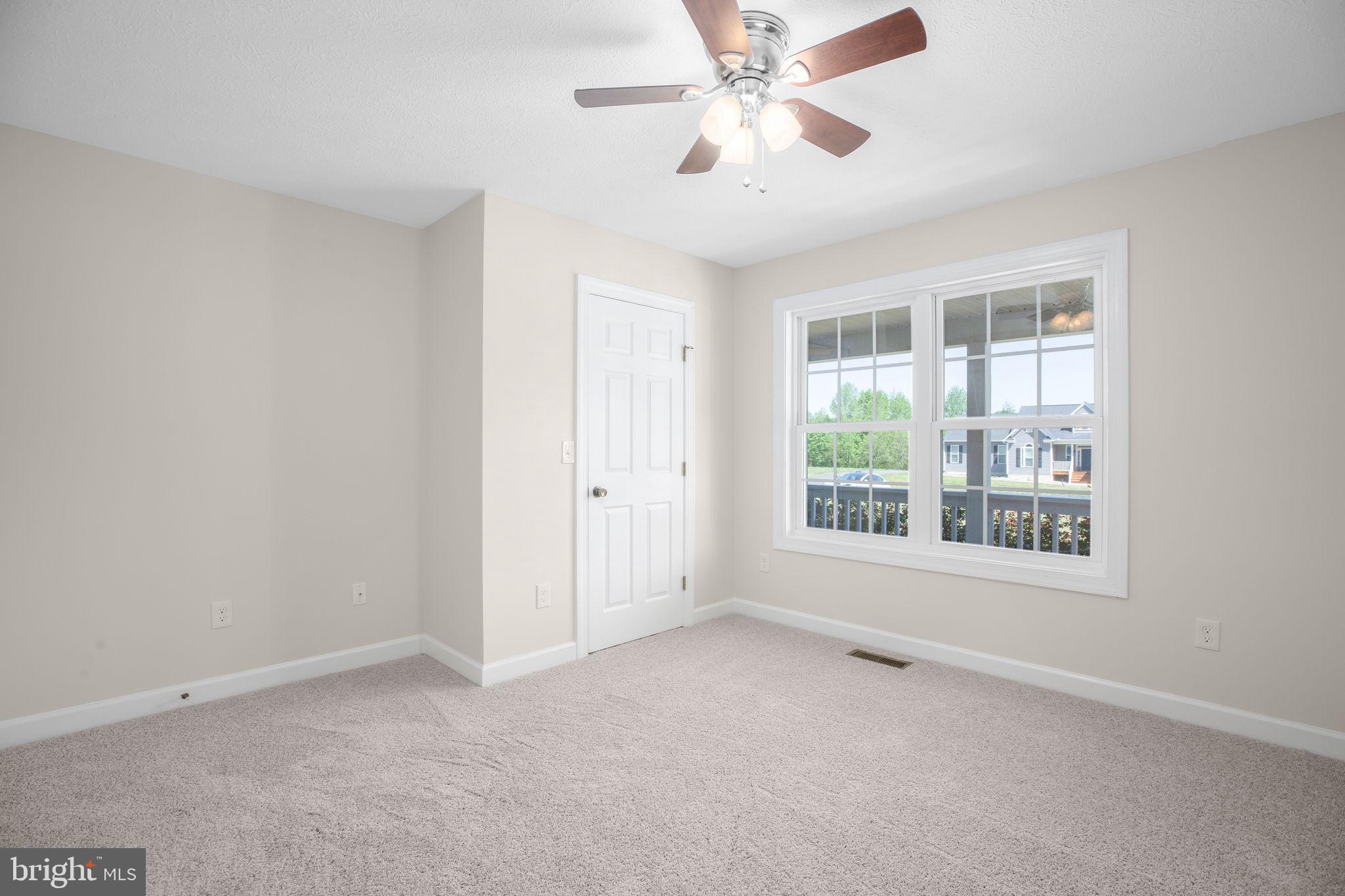 33 Austin Way Bumpass, VA 23024 - Photo 50 of 55 a view of an empty room with a window