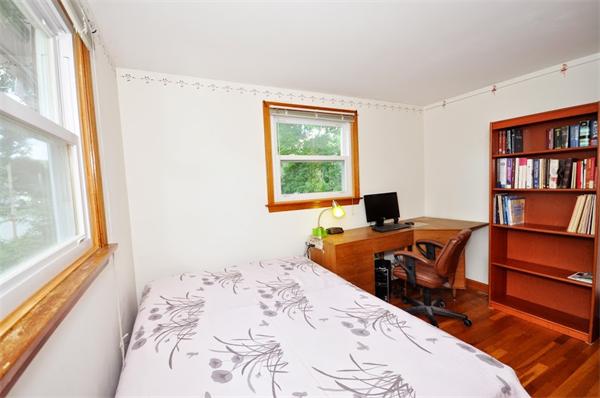 7 Senator Road Woburn, MA 01801 - Photo 11 of 26 a bedroom with a bed and a window